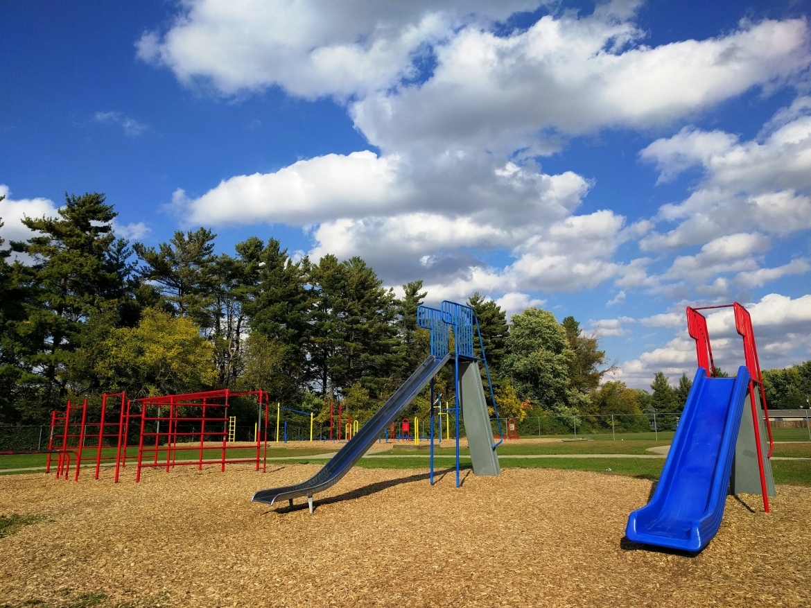 Playground with slides and monkey bars